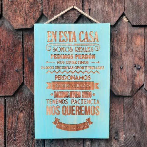 Letrero &quot;En esta casa...&quot;